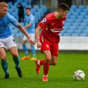 Ballymena United captain Josh Kelly (left) has been linked with a move to Glentoran ahead of the new season