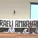 Still from YouTube video on Council meeting - on BBC