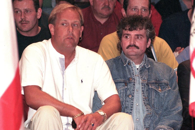 Loyalist/UDA leader Jim Gray (left) pictured with Loyalist mass murderer Michael Stone (right) at a loyalist rally in 1998.