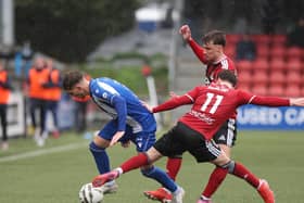 Coleraine's Finn Tonks (left) under pressure in victory over Crusaders across the Boyle Sports Premiership. (Photo by Desmond Loughery/Pacemaker Press)