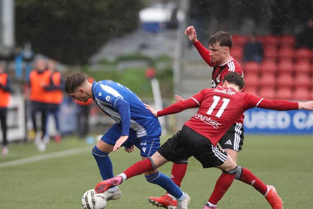 Coleraine's Finn Tonks (left) under pressure in victory over Crusaders across the Boyle Sports Premiership. (Photo by Desmond Loughery/Pacemaker Press)