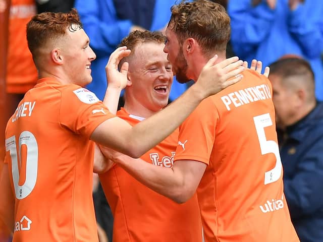 Blackpool's Shayne Lavery is congratulated on scoring his team’s first goal vs Burton Albion