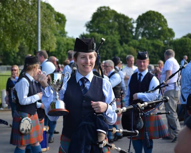 Meaghan Lyons performing with Bleary and District Pipe Band, one of the Northern Ireland bands she has played with during her 30-year piping career