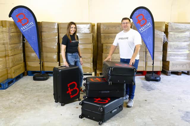 David and Sara Watson with the suitcases. Photo by Phil Magowan / Press Eye