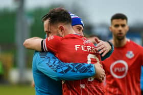 Loughgall boss Dean Smith and two-goal striker Nathaniel Ferris embrace following Saturday's 3-0 win away to Glentoran. (Photo by Andrew McCarroll/Pacemaker Press)