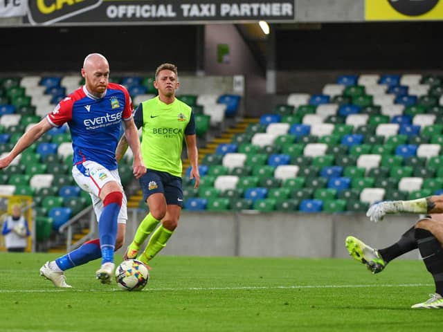 Chris Shields converts from the penalty spot in Linfield's 4-2 success over Glenavon at Windsor Park. (Photo by Andrew McCarroll/Pacemaker)