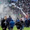 Sunday's pitch invasion at Ibrox following victory for Celtic over Rangers in the Scottish Gas Men's Scottish Cup quarter-final match. (Photo by Andrew Milligan/PA Wire)