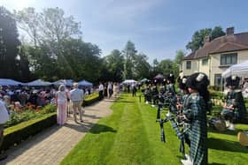 It was 27 Celsius at 5pm at the US consul's residence in Shaw's Bridge on Thursday when the outgoing consul James Applegate spoke to mark the US 250th anniversary. Later the temperature in Belfast actually rose a bit in the evening to 28C. Pictured on the right is the band of Campbell College, which had played the national anthem. Pic Ben Lowry