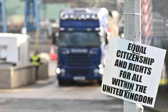 A protest sign against EU trade restrictions on goods coming into NI from GB last year at the port of Larne. A major horticulural trade body has warned that one reason difficulties have not been apparent in the operation of the Windsor Framework after 11 days is that GB traders who stopped supplying NI due to the NI Protocol have not restarted their trade.
Photo Colm Lenaghan/Pacemaker Press