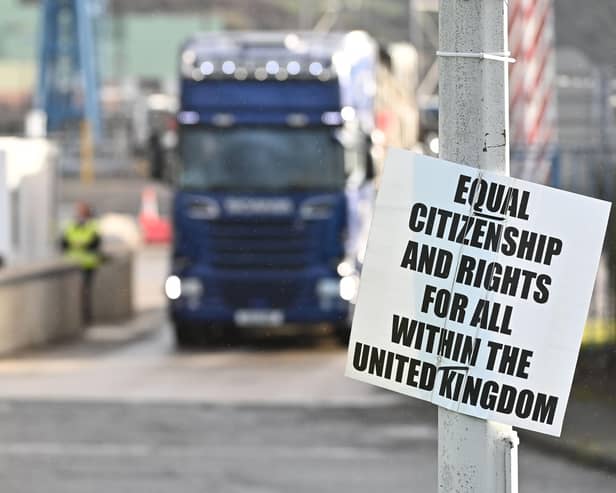A protest sign against EU trade restrictions on goods coming into NI from GB last year at the port of Larne. A major horticulural trade body has warned that one reason difficulties have not been apparent in the operation of the Windsor Framework after 11 days is that GB traders who stopped supplying NI due to the NI Protocol have not restarted their trade.
Photo Colm Lenaghan/Pacemaker Press