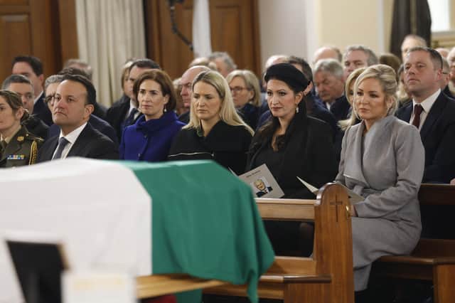 First Minister of Northern Ireland Michelle O'Neill (right) with Deputy First Minister of Northern Ireland Emma Little-Pengelly (second right), during the state funeral service of former taoiseach John Bruton at Saints Peter and Paul's Church in Dunboyne, Co Meath. Photo: Julien Behal/Government Information Service/PA Wire