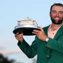 Scottie Scheffler with the Masters trophy and green jacket after winning at Augusta National. (Photo by Warren Little/Getty Images)