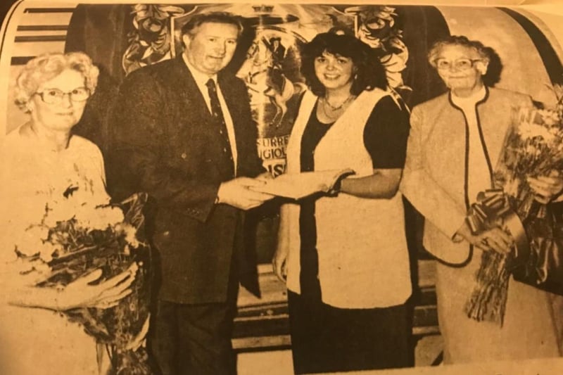 Bro George Creith, then secretary of Dunseverick lol 528 pictured in the 1980s presenting a bible to Mrs Barbara Brogan for her work collecting for the Lord Enniskillen Orange Orphans. Including in the picture is Nora McKay and Netta McCurdy. Mrs Brogan has now been collecting for over 50 years