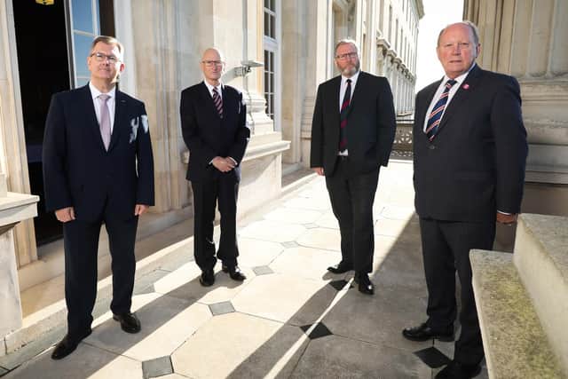 In September 2021 UUP leader Doug Beattie stood with Sir Jeffrey Donaldson (DUP), Billy Hutchinson (PUP) and Jim Allister (TUV) in a joint unionist stand against the NI Protocol. Photo by Kelvin Boyes / Press Eye