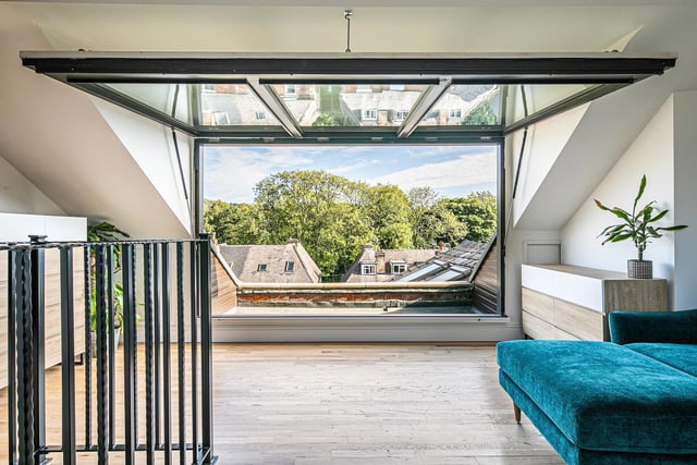 The spectacular master suite to the loft level takes full advantage of the views towards Endcliffe park and has a full sized opening window giving access to an occasional roof terrace.