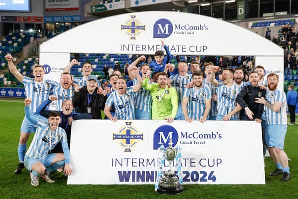 Immaculata celebrate success over Crumlin Star in the McComb’s Coach Travel Intermediate Cup final. (Photo by Irish Football Association)