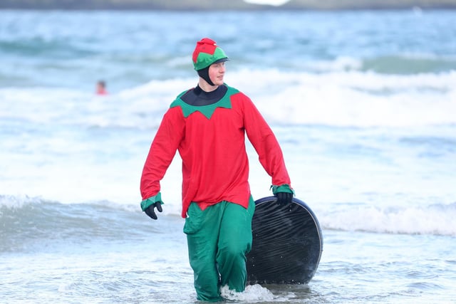 Press Eye - Belfast - Northern Ireland - 10th December 2022

Wave Project Santa Surf 2022 takes place at the east strand in Portrush, Co. Antrim.  Surfers took to the waves for the 4th annual Santa surf followed by raffles, hot drinks, mince pies and live music

Picture by Jonathan Porter/PressEye:The Wave Project Santa Surf 2022 takes place at the east strand in Portrush, Co. Antrim:The Wave Project Santa Surf