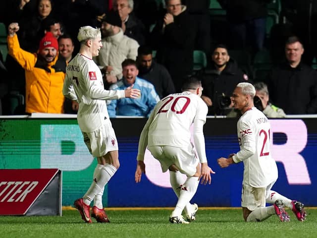 Manchester United's Antony (right) celebrates scoring during the Emirates FA Cup fourth-round match at Rodney Parade against Newport. (Photo by Nick Potts/PA Wire)