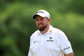 Shane Lowry of Ireland looks on from the 18th green during the first round of the 2023 Masters Tournament at Augusta National Golf Club.
