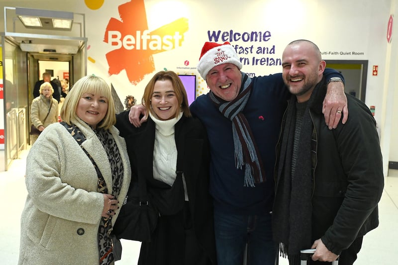 As Santa's arrival draws ever closer, friends and families were reunited at arrivals back home in Northern Ireland.  Dad Richard 
And Julie McCausland pictured meeting Son Aaron and girlfriend Sam from London home for Christmas at George Best Belfast City Airport today
Picture By: Arthur Allison: PacemakerPress.