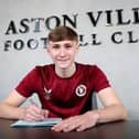 Calum Moreland after signing his first professional contract at Aston Villa. PIC: AVFC