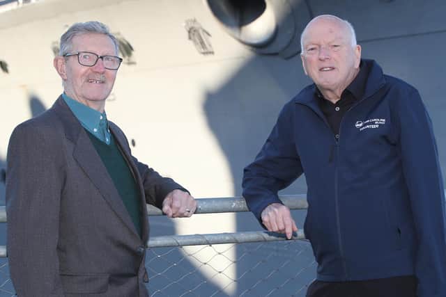 Billy McConkey (left) and John Taylor at HMS Caroline as an age-old family maritime tradition was revived on Sunday when their grandchildren were christened together onboard the historic vessel. Pic: Declan Roughan/PressEye