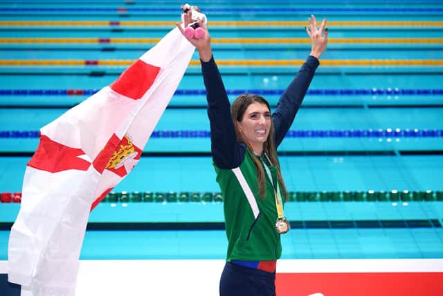 Northern Ireland's Bethany Firth celebrates with the gold medal after winning the Women's 200m Freestyle S14 Final at the Sandwell Aquatics Centre during the 2022 Commonwealth Games in Birmingham. (Photo by Peter Byrne/PA)
