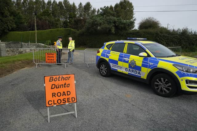 Garda close the road where a man, woman and infant boy have been killed in a road crash in Co Tipperary. The single vehicle collision occurred shortly before 9pm on Tuesday when a car hit a wall in the Windmill Knockbulloge area of Cashel. Picture: Niall Carson/PA Wire