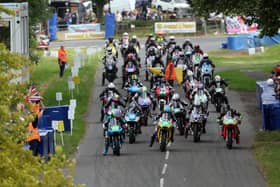 Michael Sweeney (65, Aprilia) and Shaun Anderson (31, Aprilia) lead the Supertwin pack off the start line at the Tandragee 100. (Photo by Stephen Davison/Pacemaker Press)