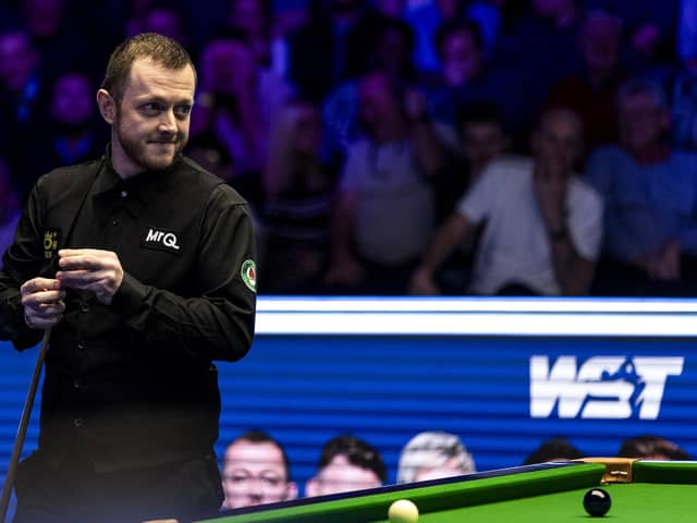 Mark Allen before potting the black and making a 147 in his quarter final match against Mark Selby (not in picture) during day six of the MrQ Masters at Alexandra Palace, London. PIC: Steven Paston/PA Wire.