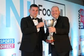 Donal McConnell of Reavey’s Solicitors presents the Manager of the Year to Loughgall's Dean Smith
