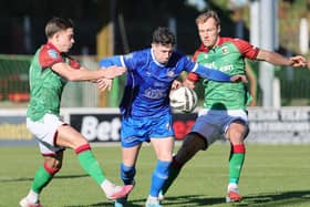 Limavady's Lewis Tosh is closed down by Glentoran's Jack Malone and Gregory Sloggett. (Photo by David Maginnis/Pacemaker Press)
