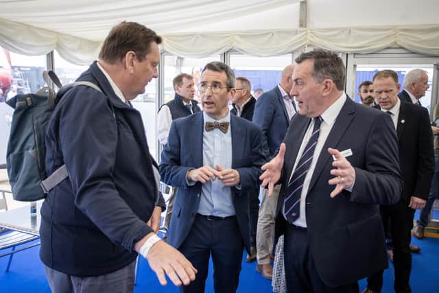 Michael Bell, Minister Andrew Muir and George Mullan from ABP during Balmoral Show. (Pic: McAuley Multimedia)