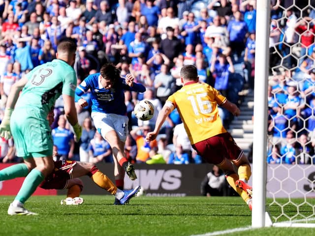 Rangers’ Mikey Moore (centre) has a shot at goal during defeat on Sunday by Motherwell at Ibrox. (Photo by Andrew Milligan/PA Wire)