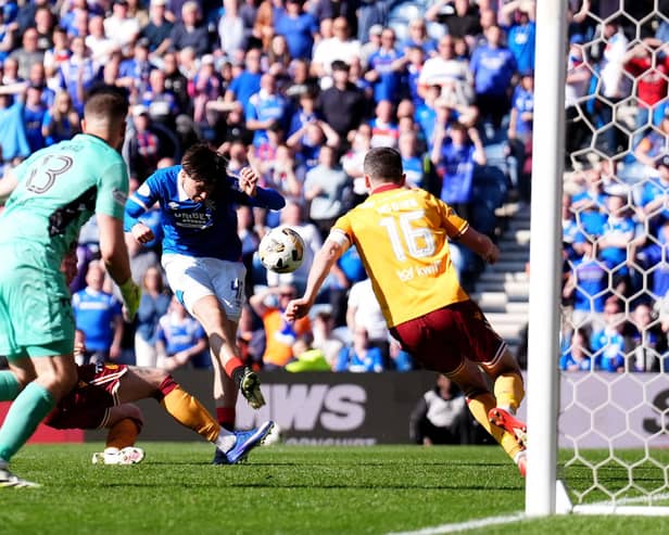 Rangers’ Mikey Moore (centre) has a shot at goal during defeat on Sunday by Motherwell at Ibrox. (Photo by Andrew Milligan/PA Wire)