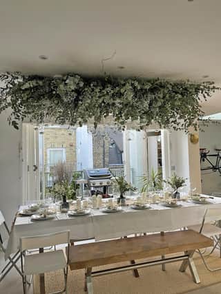 A branch chandelier created by Mary-Anne Da'marzo, founder and head florist of The Last Bunch.