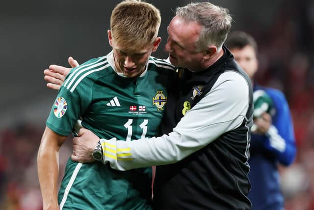 Northern Ireland manager Michael O’Neill offers consolation to Callum Marshall after the striker had a debut goal ruled out by VAR in the 1-0 loss to Denmark.