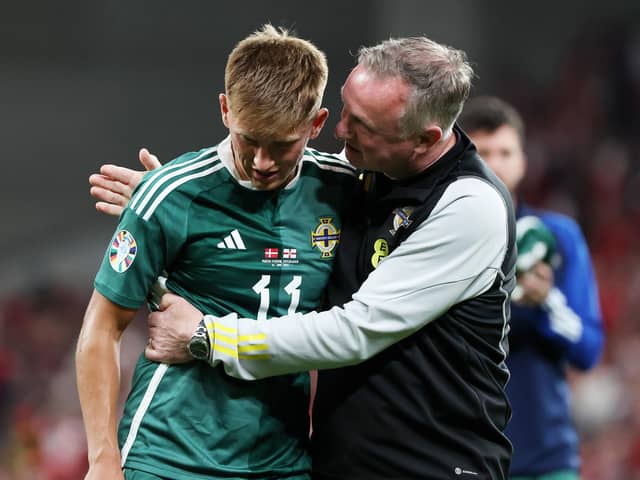 Northern Ireland manager Michael O’Neill offers consolation to Callum Marshall after the striker had a debut goal ruled out by VAR in the 1-0 loss to Denmark.