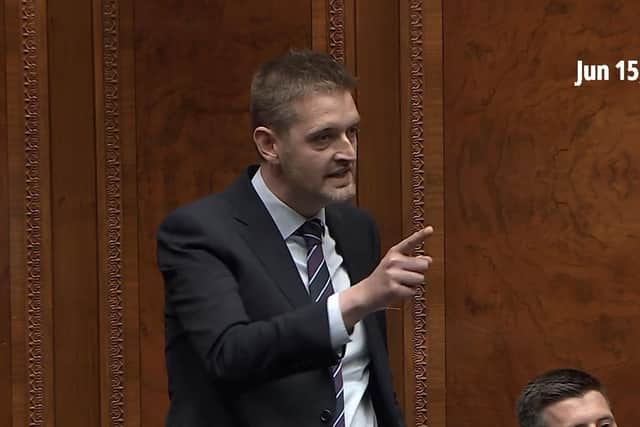 Phillip Brett castingating rival parties in the Assembly on Monday
