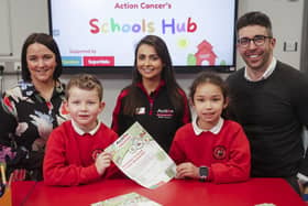 L-R Jenifer Morton, Centra Brand Manager; Lucas Blair and Kirsten Wylie, both in the P5/6 class in Moy Regional Primary School; Tanya Carson, Health Improvement Officer, Action Cancer and Gary Cunningham, SuperValu Brand Manager.