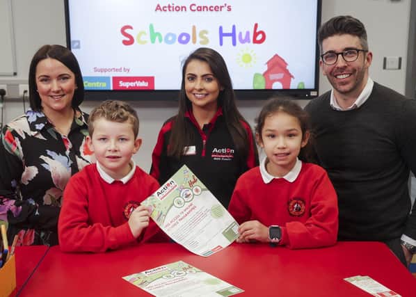 L-R Jenifer Morton, Centra Brand Manager; Lucas Blair and Kirsten Wylie, both in the P5/6 class in Moy Regional Primary School; Tanya Carson, Health Improvement Officer, Action Cancer and Gary Cunningham, SuperValu Brand Manager.