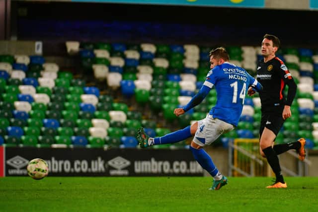 Linfield's Robbie McDaid scores Linfield's third goal in the 3-1 win over Carrick Rangers at Windsor Park on Saturday.