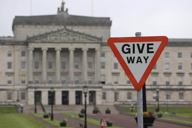 A Give Way sign at Parliament Buildings at Stormont, Belfast, following the historic result at the weekend with Sinn Fein overtaking the DUP to become the first nationalist or republican party to emerge top at Stormont. Picture date: Monday May 9, 2022.