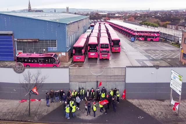 Transport workers taking part in a 24 hour strike in east Belfast on 1 December 2023.  Ulsterbus, Metro, Glider and Goldliner buses and coaches were locked in depots across Northern Ireland while workers picketed outside. Picture by Jonathan Porter/PressEye