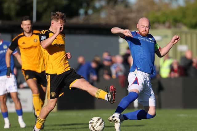 Linfield's Chris Shields (right) competing against Aidan Steele in the 2-2 draw with Carrick Rangers. (Photo by Desmond Loughery/Pacemaker Press)