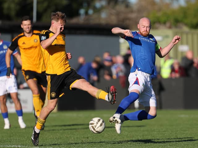 Linfield's Chris Shields (right) competing against Aidan Steele in the 2-2 draw with Carrick Rangers. (Photo by Desmond Loughery/Pacemaker Press)