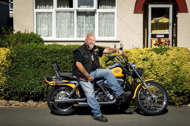Trevor Manlow, a 53 year-old motorcycle dealer in Hillingdon, West London with his 2000 Harley Davidson Dyna Wide Glide which does not comply with ULEZ emission standards when the boundary expands.  Mr Manlow is locked into a 5 year finance deal on the bike with over 3 and a half years left on the deal.