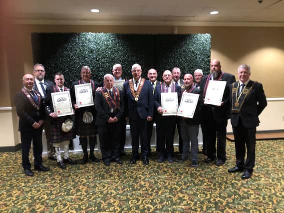 Sovereign Grand Master Rev William Anderson with Grand Master of the Grand Black Chapter USA James McCullough, Red Cross certificate recipients and lecturing teams