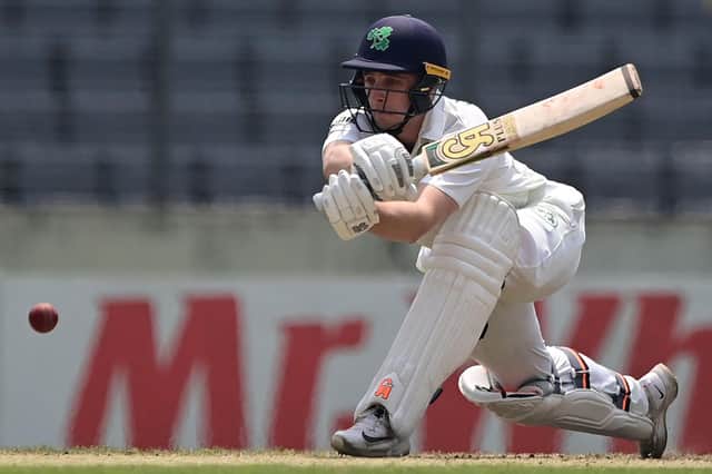 Ireland's Lorcan Tucker plays a shot during the third day of the Test match against Bangladesh at the Sher-e-Bangla National Cricket Stadium in Dhaka.