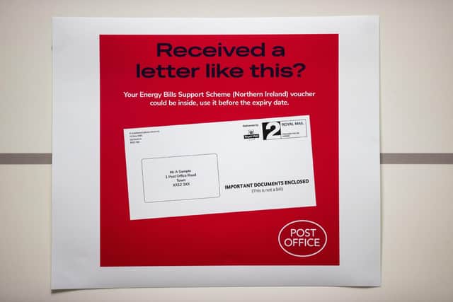File photo dated 16/01/23 of a sign at the Belfast City branch of the Post Office showing an example image of the envelope for the Energy Bills Support Scheme (Northern Ireland) voucher, giving householders £600. Photo: Liam McBurney/PA Wire